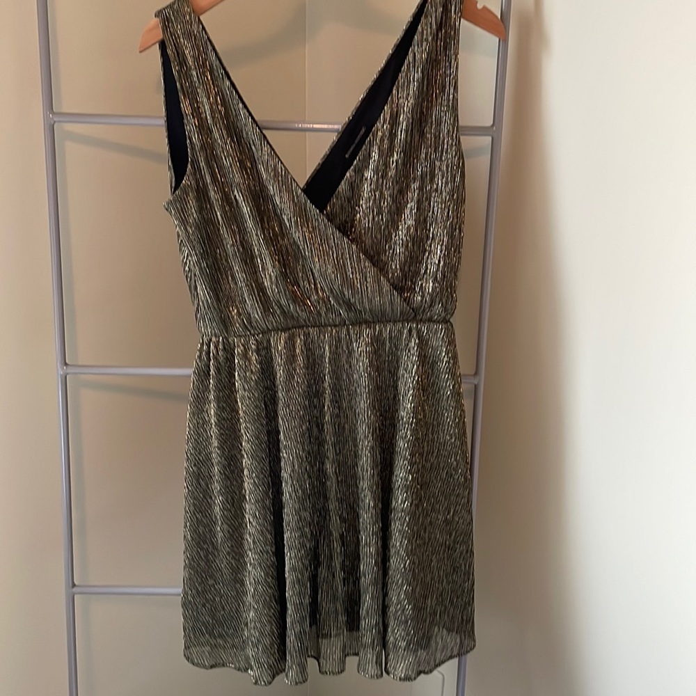 Black and gold mini dress